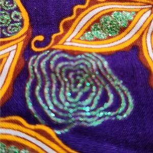 This is a custom-made African print one shoulder dress. a size medium